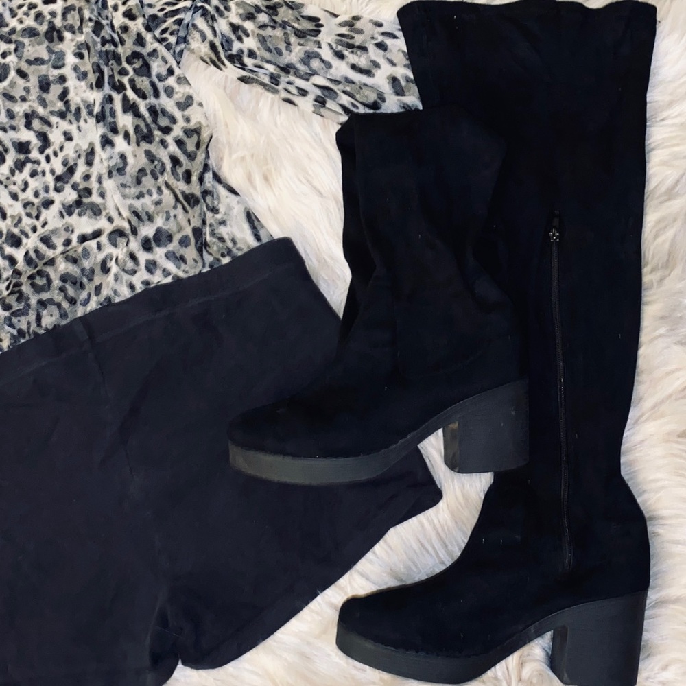 Black over-the-knee boots with a block heel
